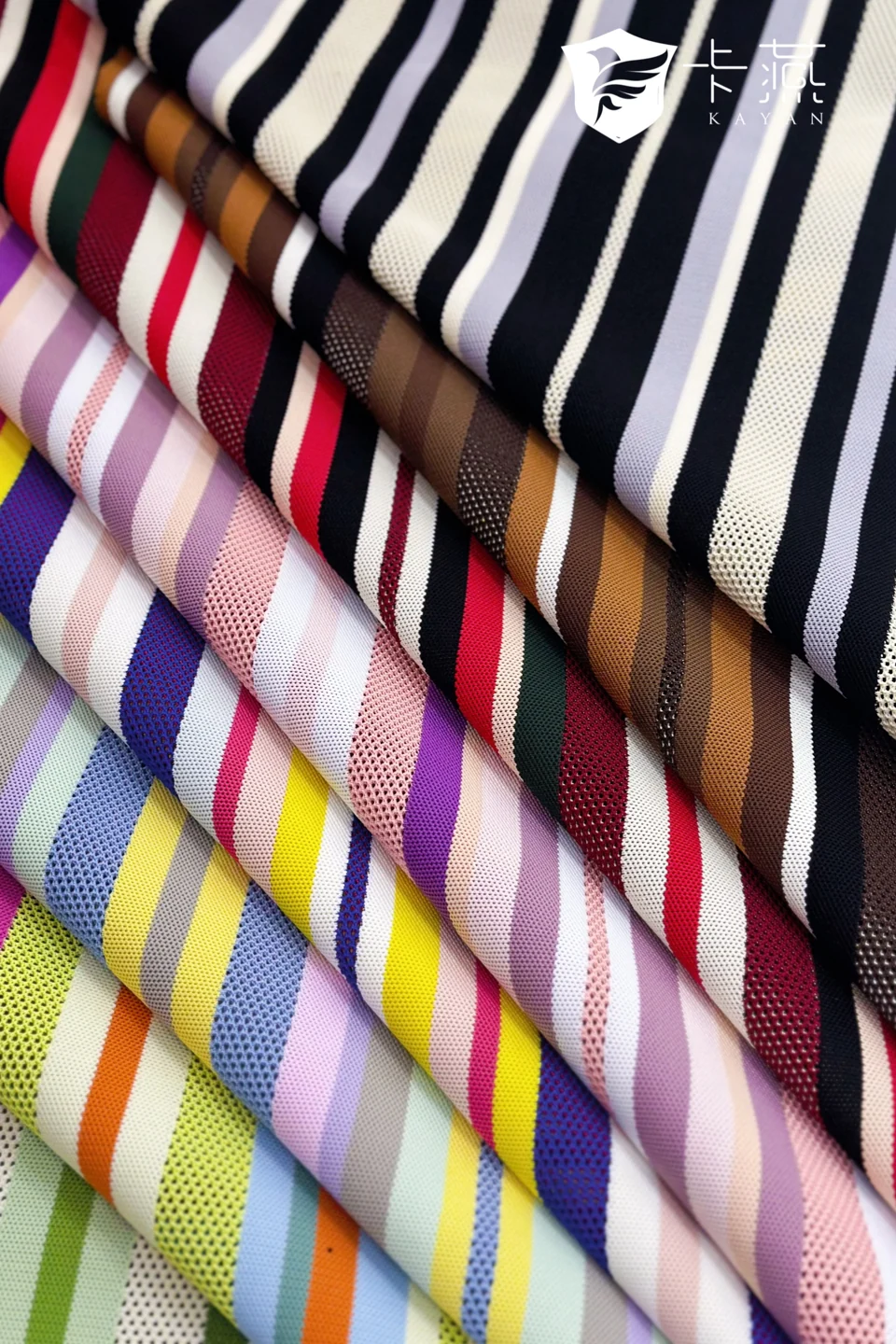 KS-96920: Contrasting stripes meet an open textile structure. A multicolour study in rhythm, repetition and scale.