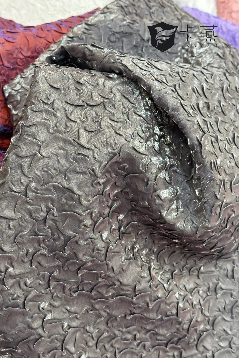 KS-98740: A softly reflective surface with an irregular, raised texture. Folds reveal the contrast between light and shadow.