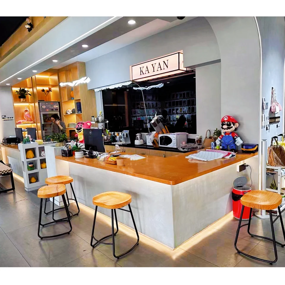 KAYAN's actual showroom with textile samples, bags and KAYAN signage